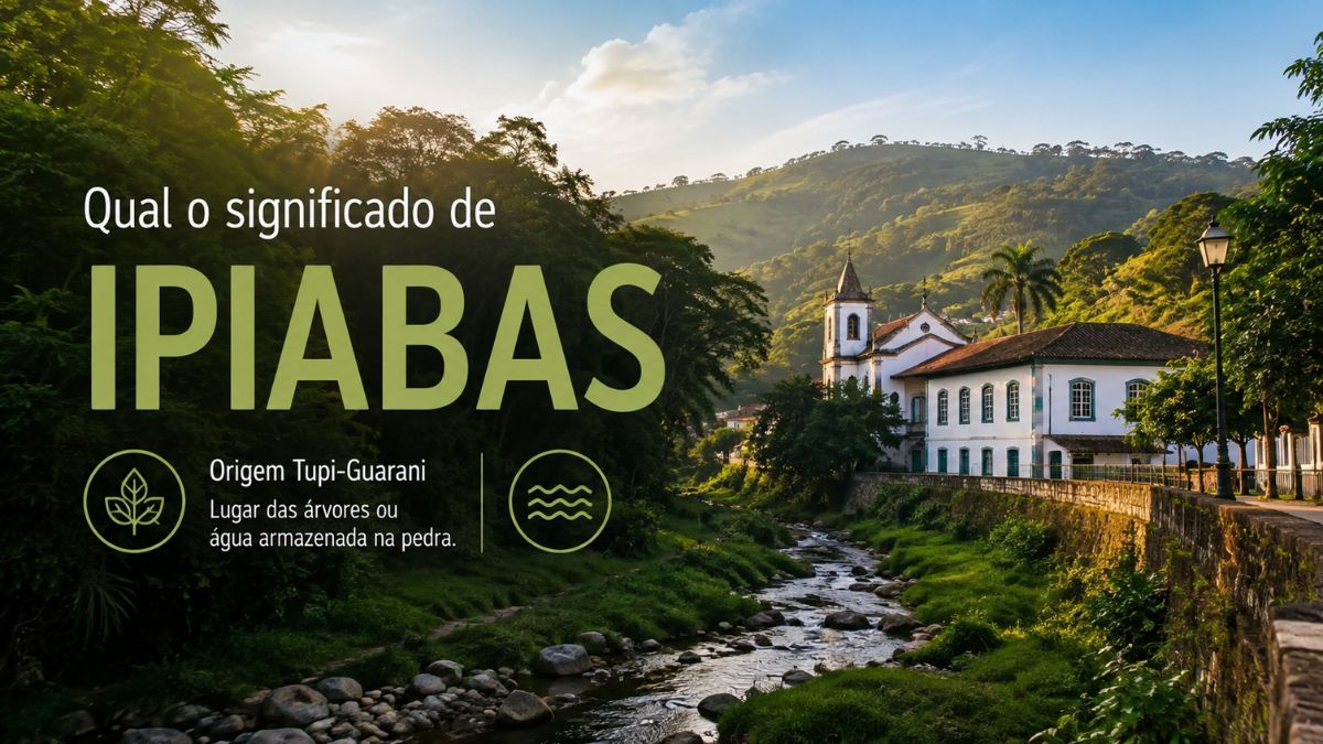 Fotografia externa exibindo um riacho com pedras cortando uma vila verdejada com uma igreja branca e construções antigas sob uma montanha ensolarada.