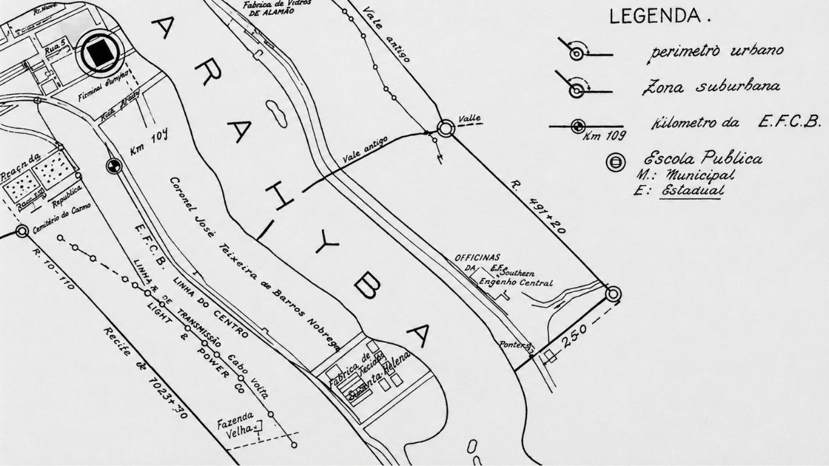 Mapa técnico de 1927 em preto e branco detalhando as oficinas do Engenho Central e a margem do Rio Paraíba.