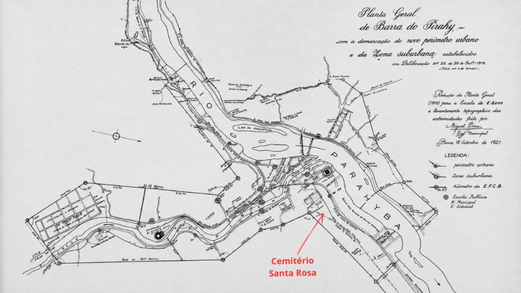 Desenho técnico antigo de um mapa urbano em preto e branco mostrando o curso do Rio Paraíba e marcações territoriais.